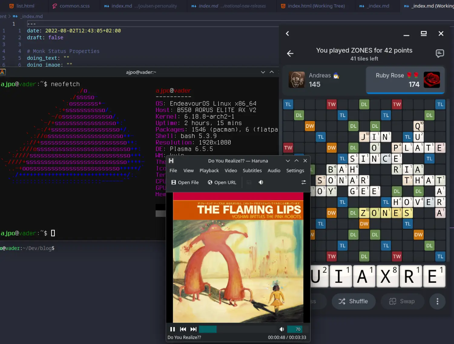 Wordfeud running alongside an audio player, a terminal emulator and my code editor.